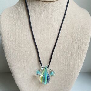 Art Glass pendant trio necklace with blue stripes and tiny mushrooms on cord